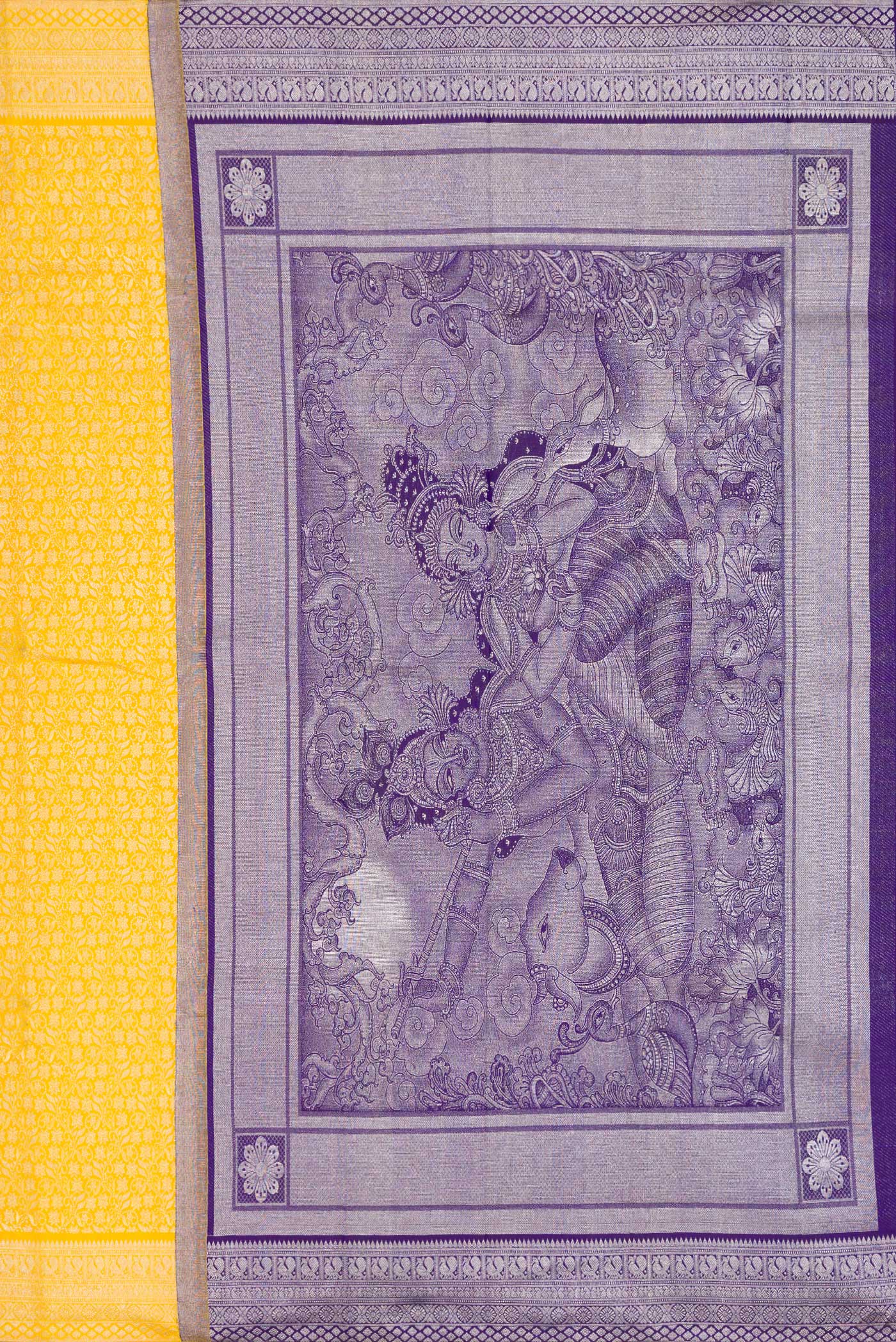 Close up image of the pallu of Yellow Kanchipuram Silk Saree with Zari Brocade on the body and Fancy Border. 