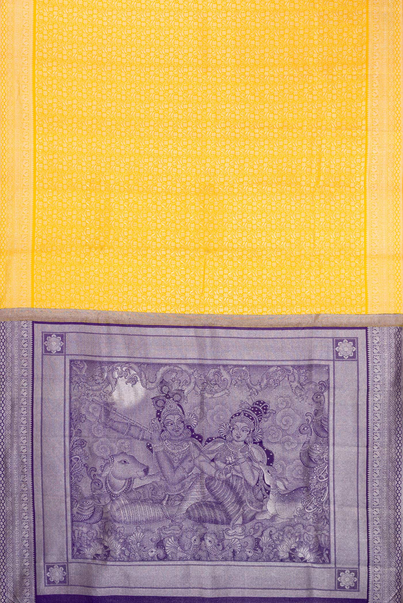 Flat view of Yellow Kanchipuram Silk Saree with Zari Brocade on the body and Fancy Border. 