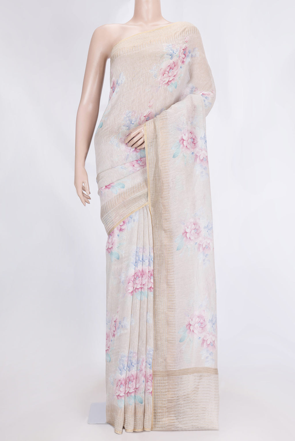 Beige Dual Tone Linen Saree with Printed design on the body and Zari Border.  displayed on a mannequin