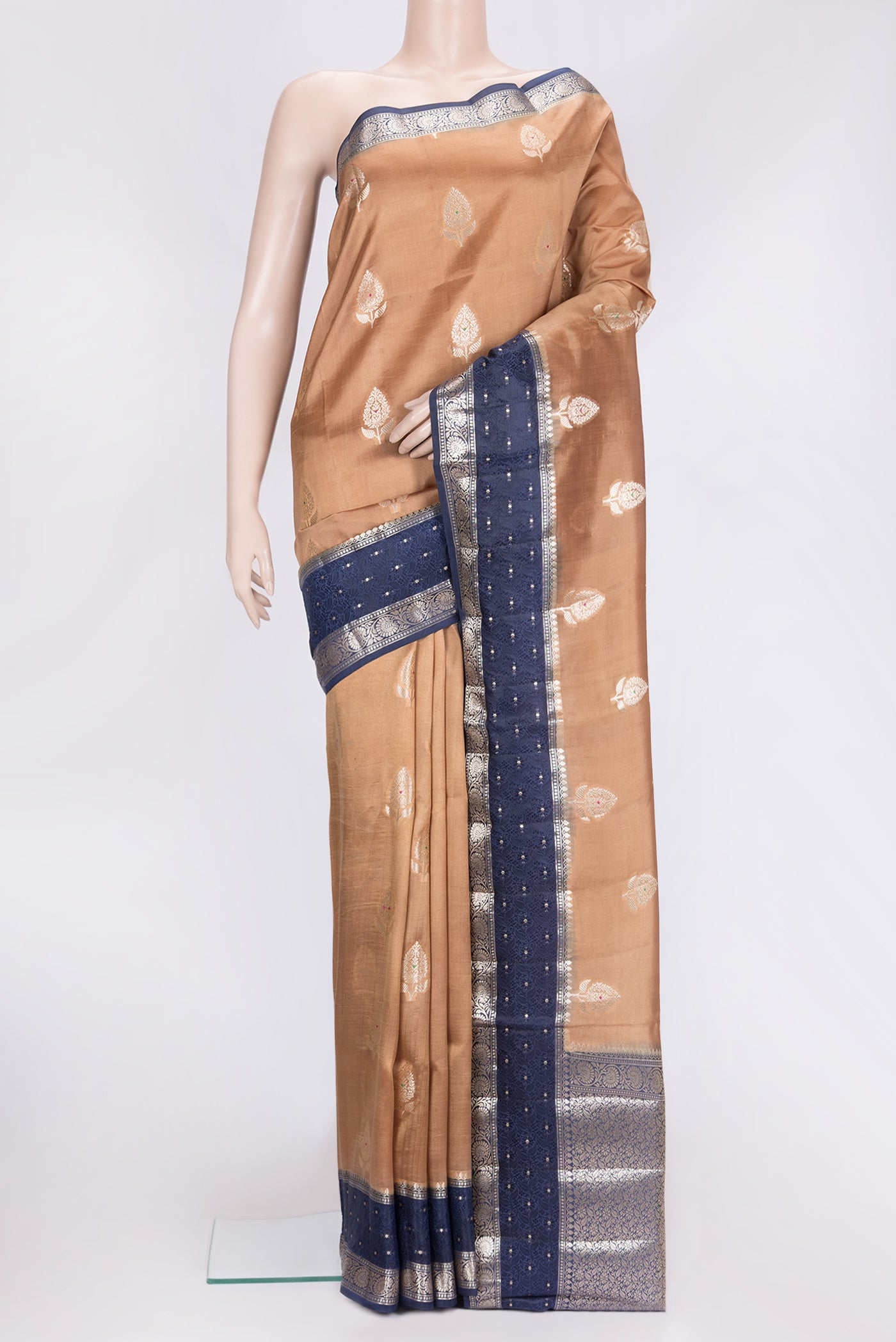 Brown Dual Tone Tussar Silk Saree with Zari Butta on the body and Fancy Border.  displayed on a mannequin