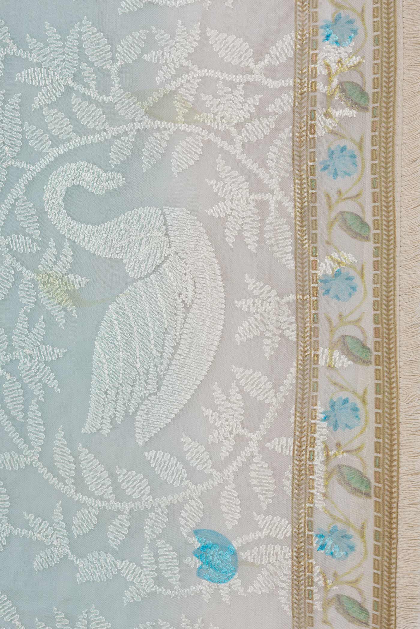 Border image of Light Blue Dual Tone Organza Silk Saree with Embroidery on the body and Embroidery Border. 