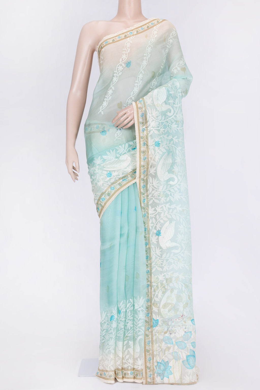Light Blue Dual Tone Organza Silk Saree with Embroidery on the body and Embroidery Border.  displayed on a mannequin