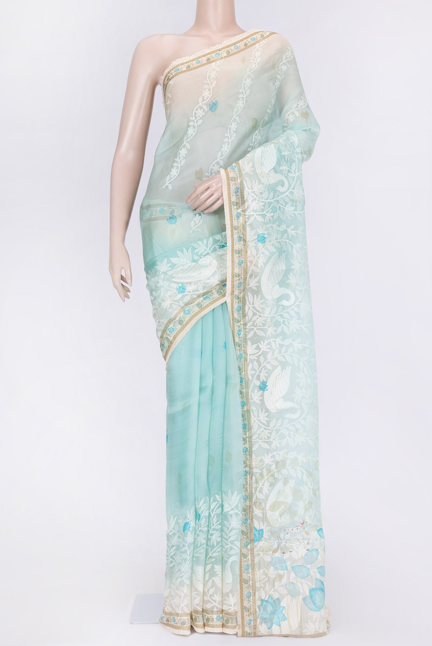 Light Blue Dual Tone Organza Silk Saree with Embroidery on the body and Embroidery Border.  displayed on a mannequin