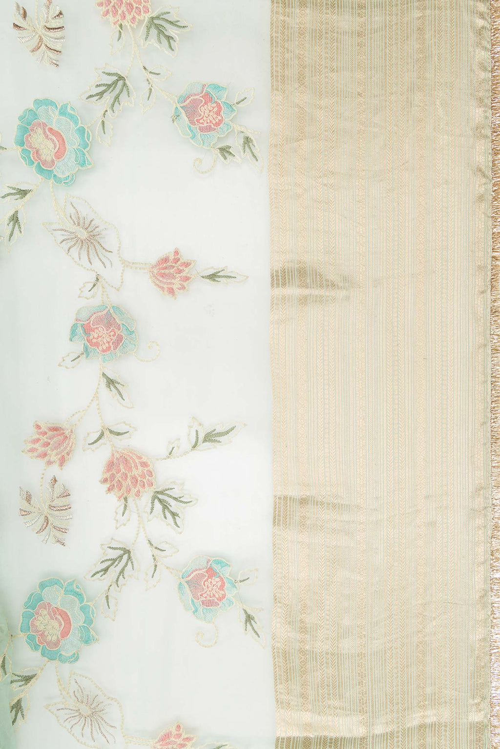 Border image of Light Green Dual Tone Organza Silk Saree with Embroidery on the body and Zari Border. 