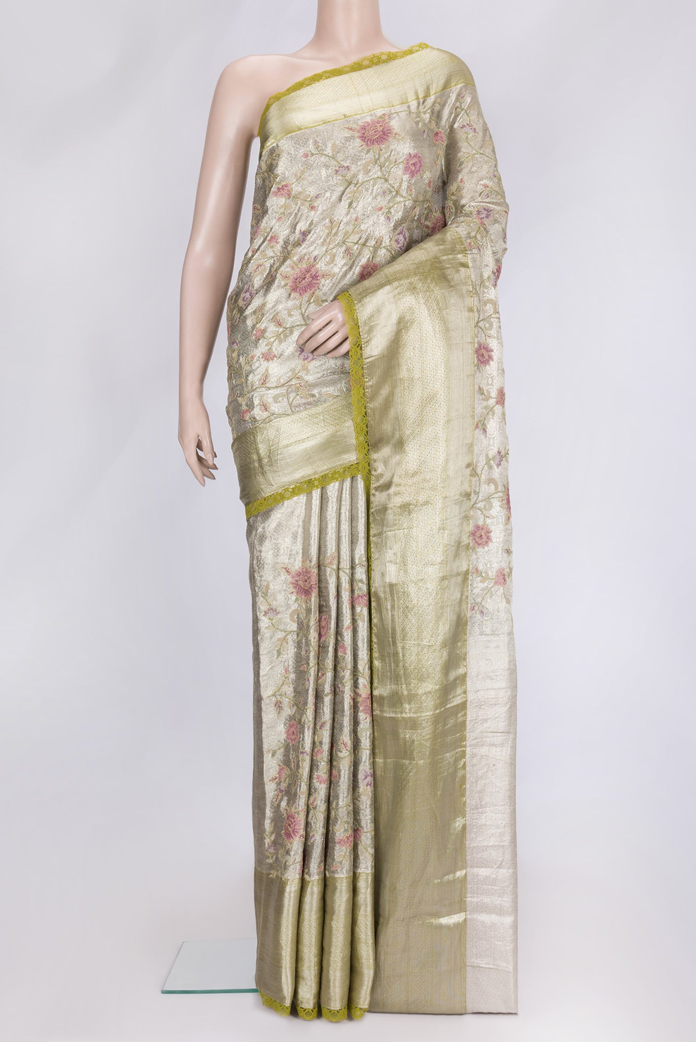 Gold Dual Tone Organza Silk Saree with Zari Brocade on the body and Zari Border.  displayed on a mannequin