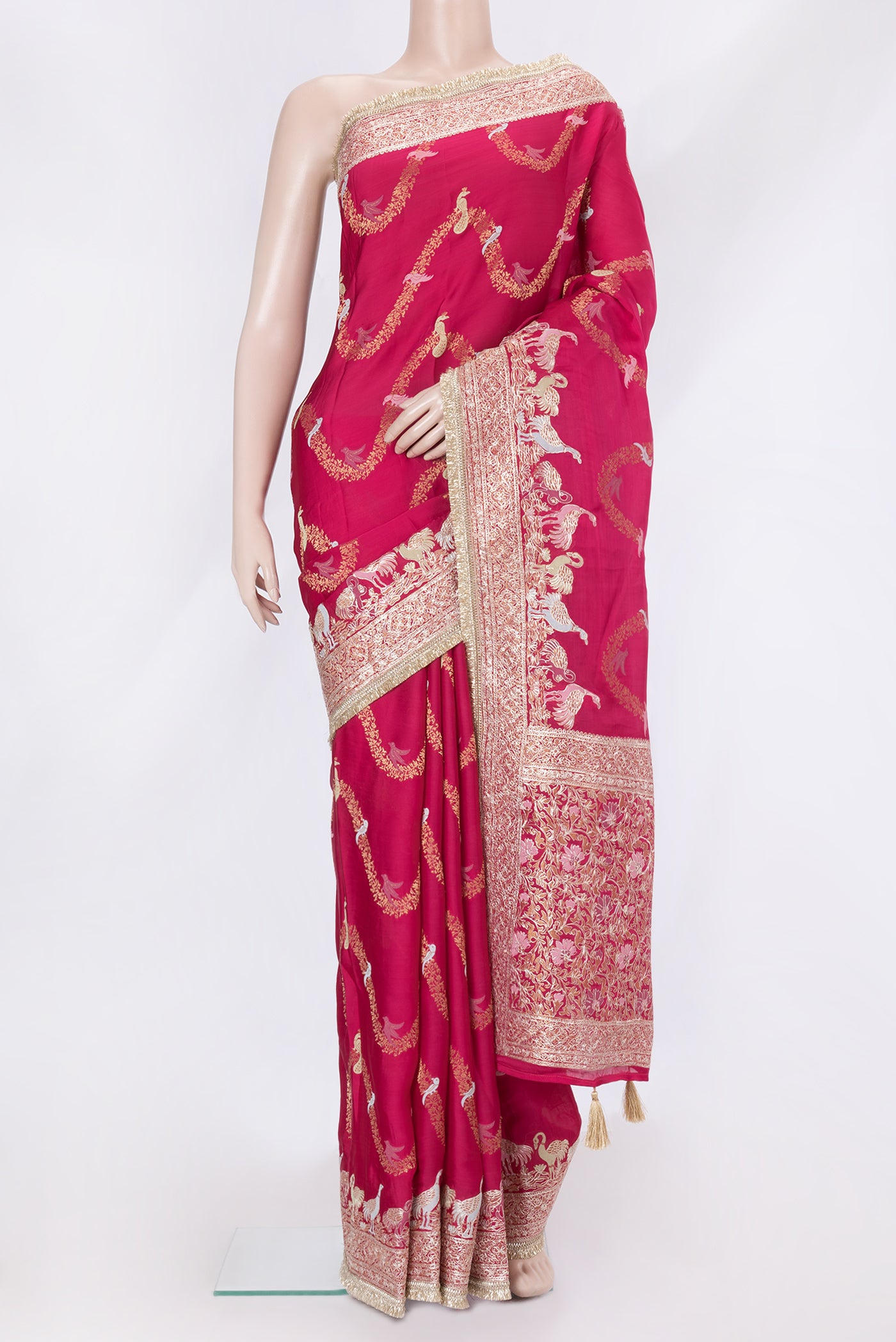 Pink Dual Tone Banarasi Georgette Saree with Zari Brocade on the body and Embroidery Border.  displayed on a mannequin