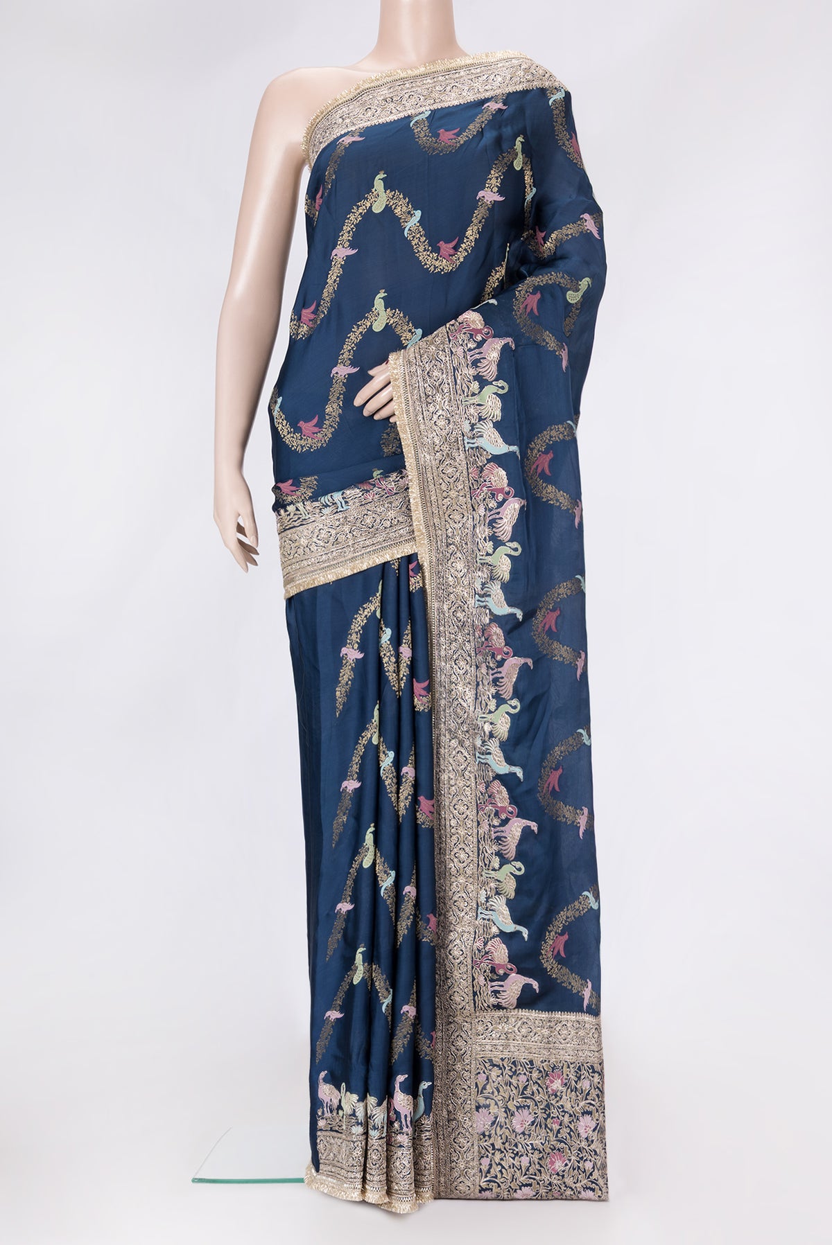 Navy Blue Dual Tone Satin Crepe Saree with Embroidery on the body and Embroidery Border.  displayed on a mannequin