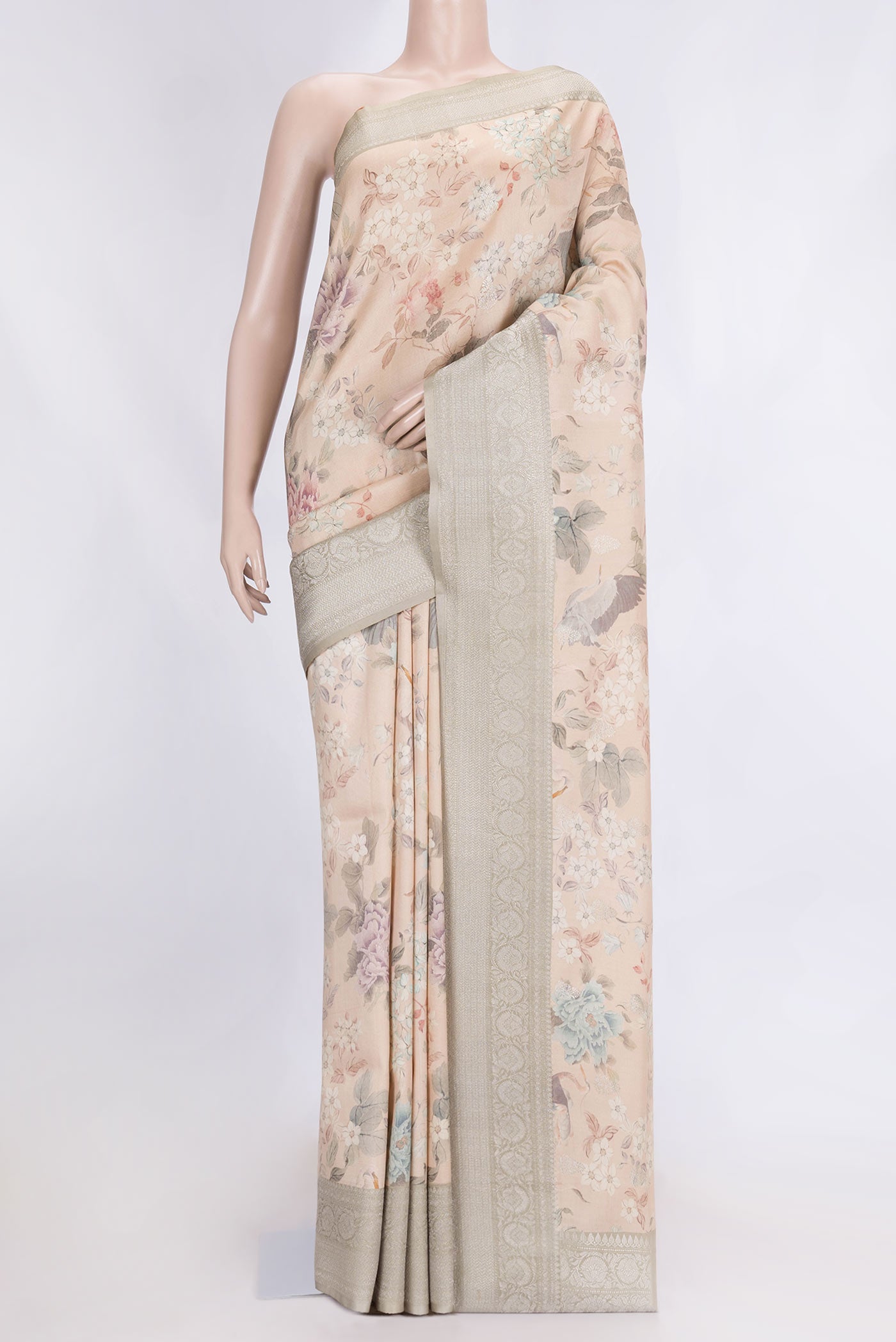 Peach Dual Tone Tussar Saree with Zari Butta on the body and Zari Border.  displayed on a mannequin