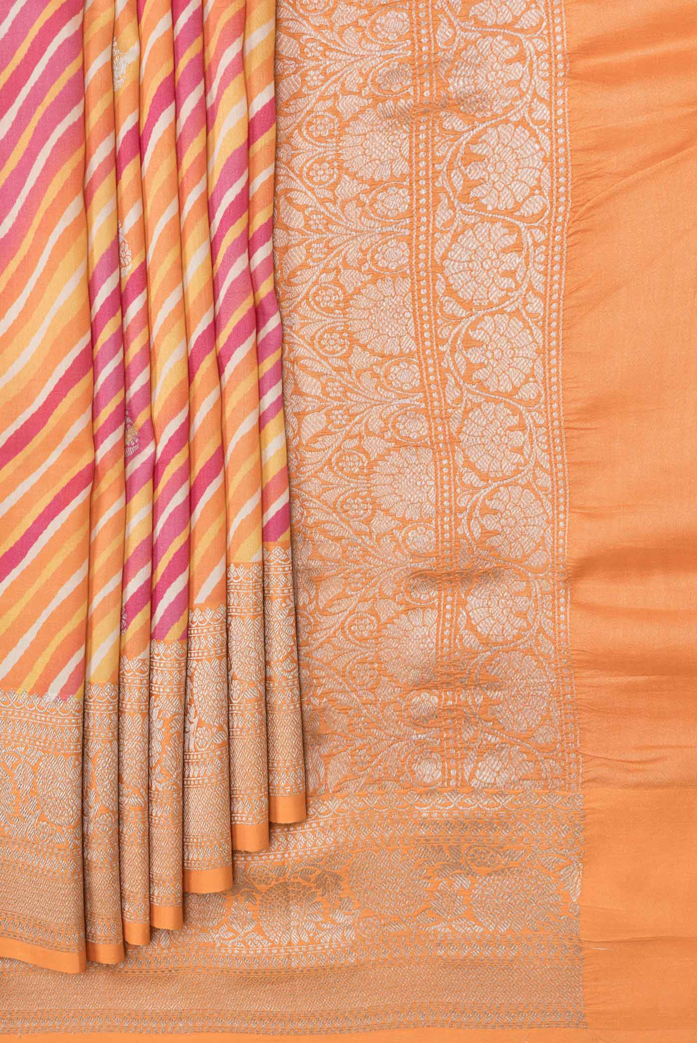 Pleats and pallu of Pink and Orange Color Tussar Saree with Zari Butta on the body and Zari Border. 