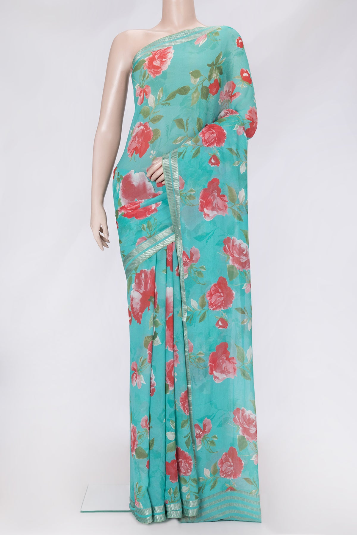 Sea Green Dual Tone Mysore Chiffon Saree with Printed design on the body and Zari Border.  displayed on a mannequin