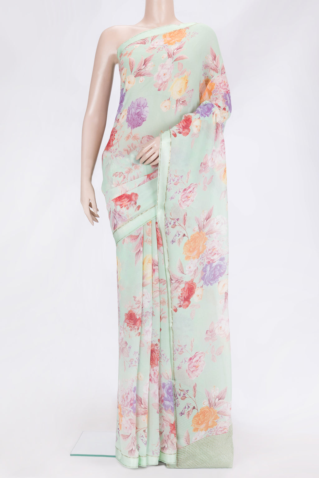 Pista Green Dual Tone Mysore Chiffon Saree with Printed design on the body and Thin Zari Line.  displayed on a mannequin