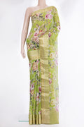 Parrot Green Mysore Chiffon Saree with Floral Print on the body and Zari Border.  displayed on a mannequin