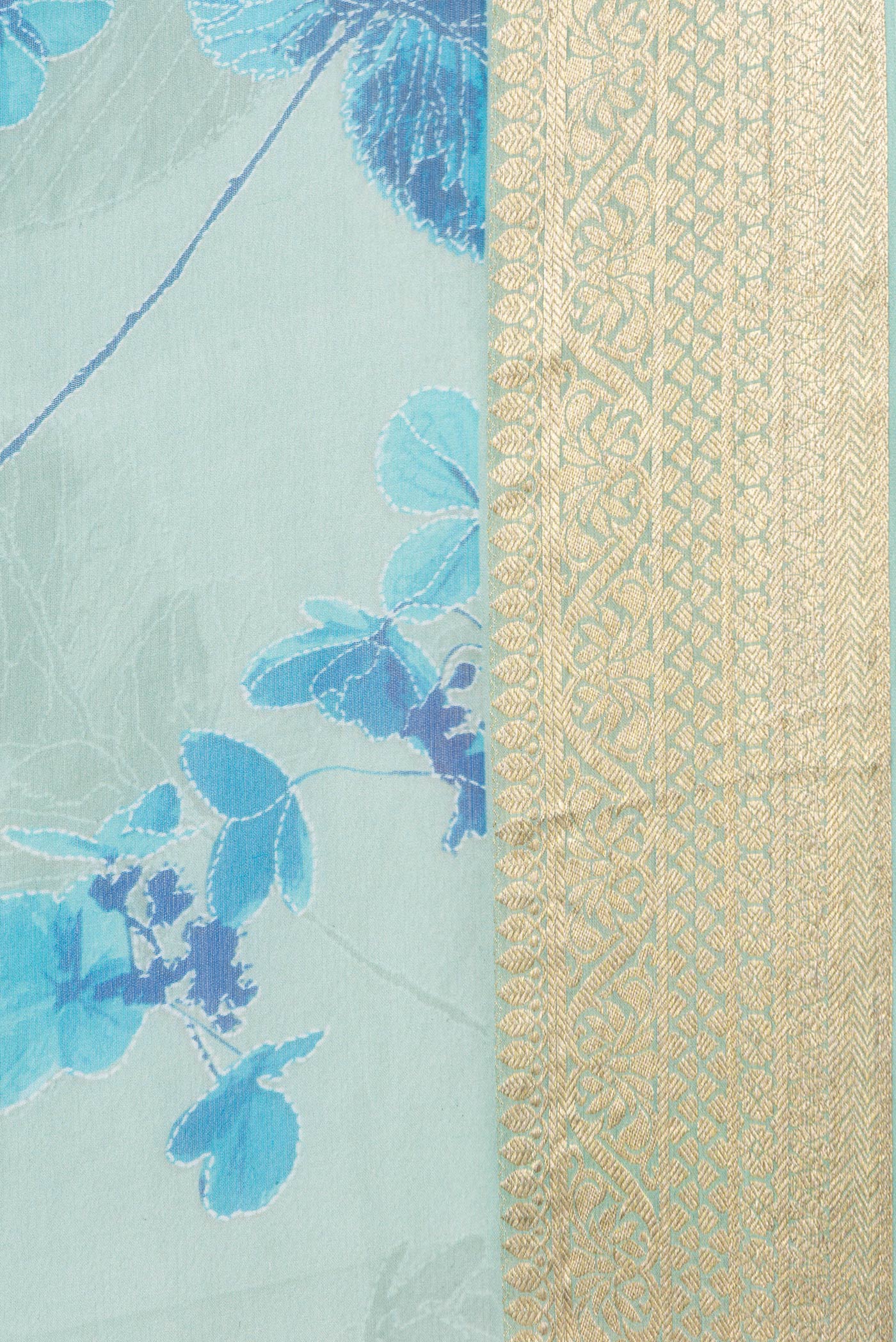 Border image of Sea Green Dual Tone Mysore Chiffon Saree with Printed design on the body and Zari Border. 