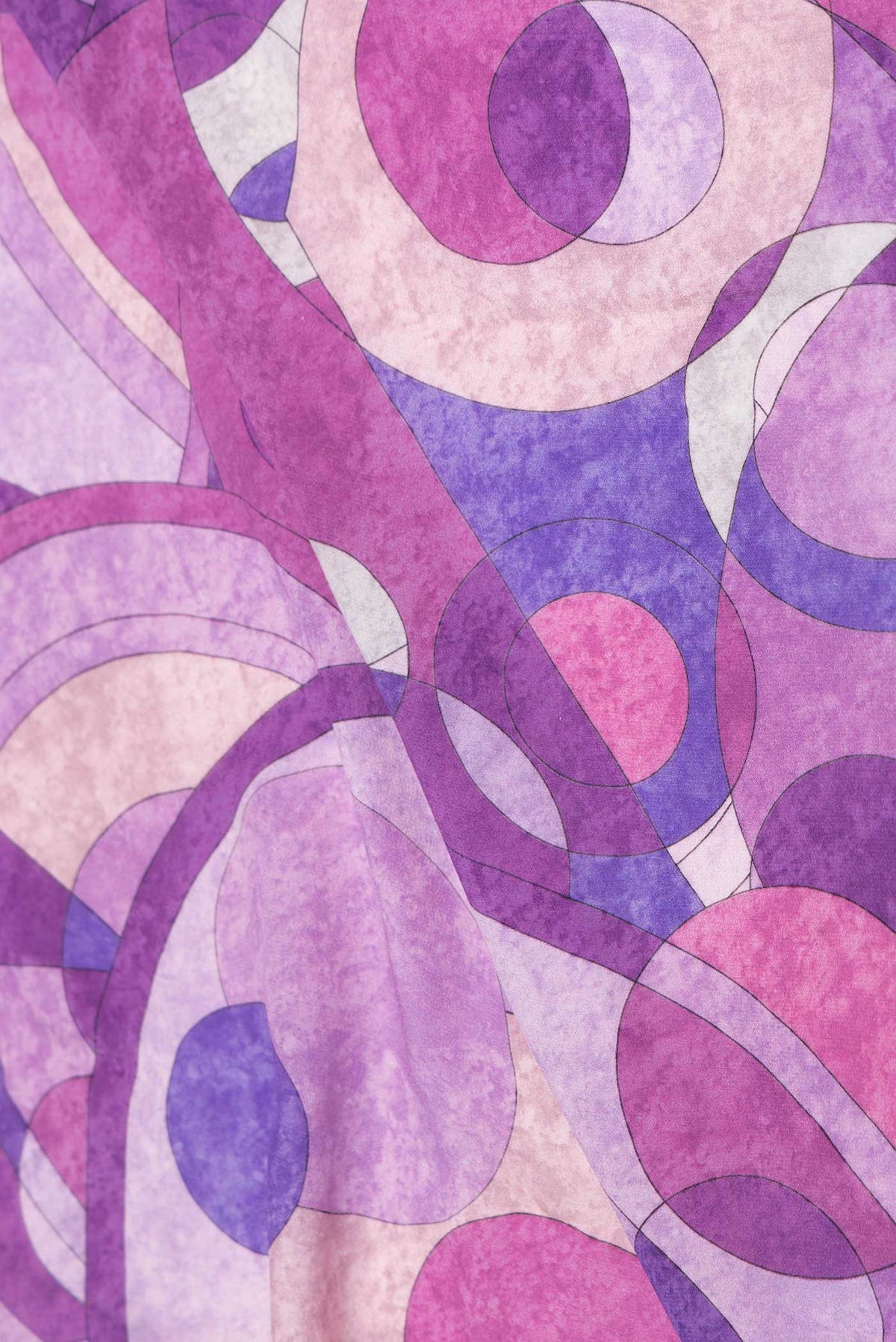 Close up of Lavender Dual Tone Mysore Crepe Saree with Printed design on the body and Printed Border displaying folds
