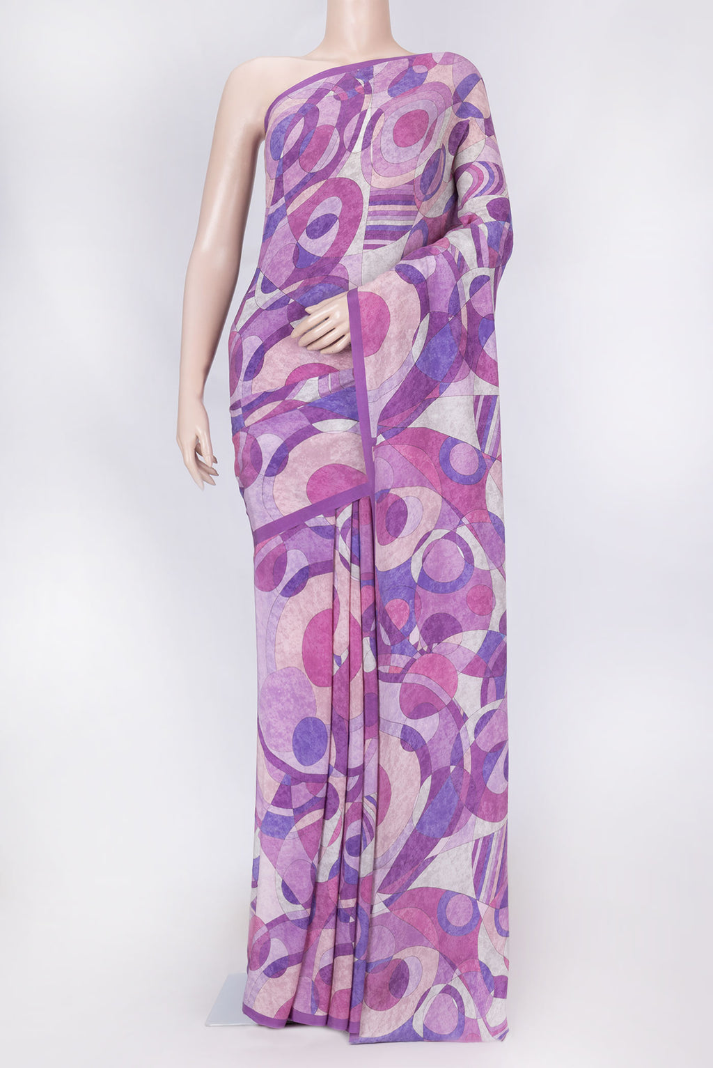 Lavender Dual Tone Mysore Crepe Saree with Printed design on the body and Printed Border displayed on a mannequin