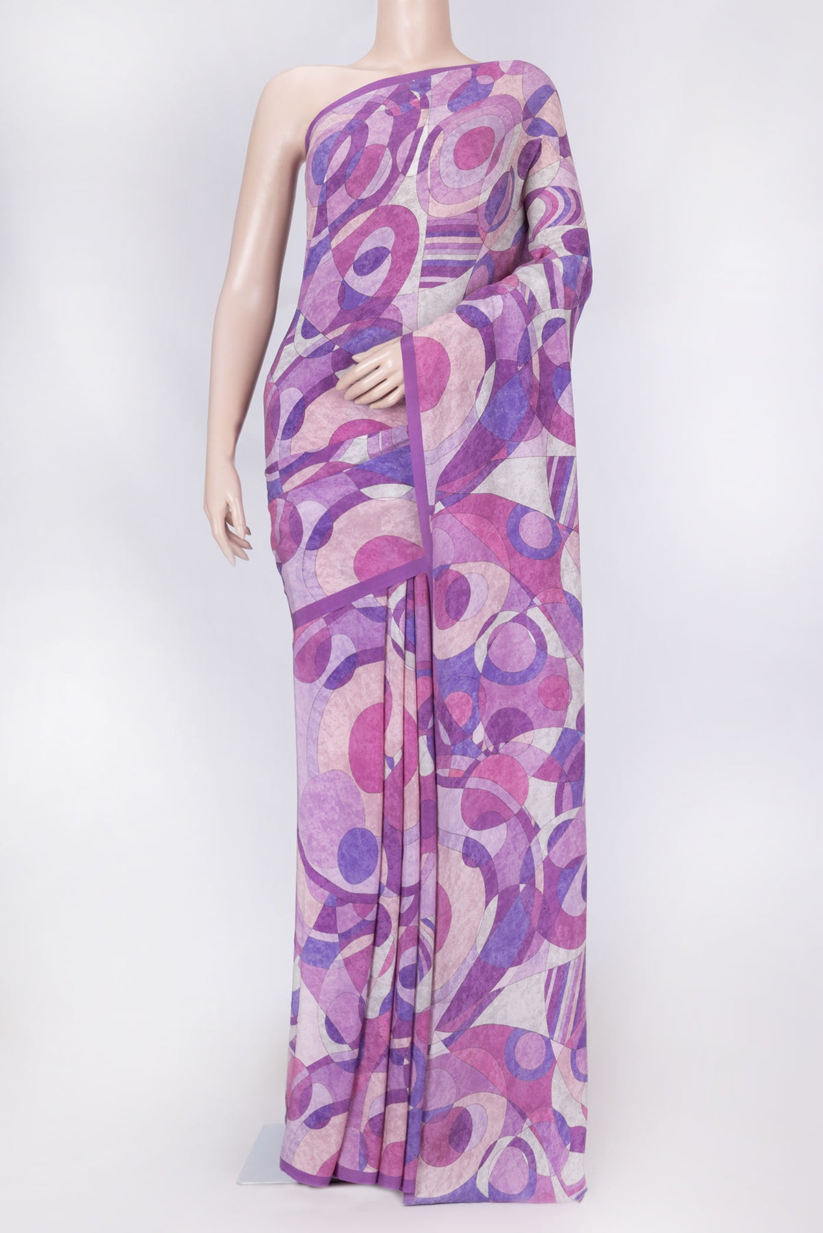 Lavender Dual Tone Mysore Crepe Saree with Printed design on the body and Printed Border displayed on a mannequin