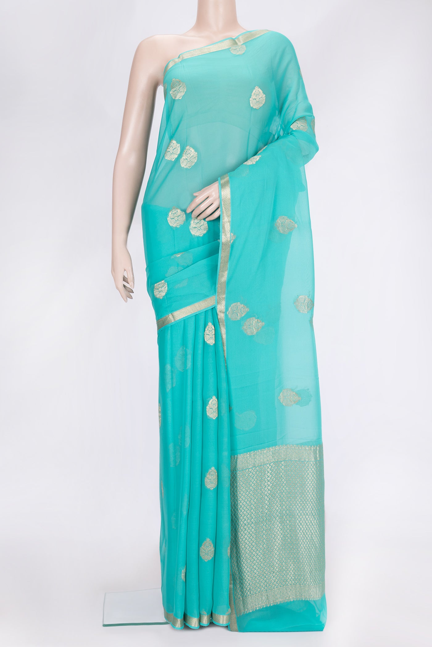 Sky Blue Dual Tone Mysore Georgette Saree with Zari Butta on the body and Zari Border.  displayed on a mannequin