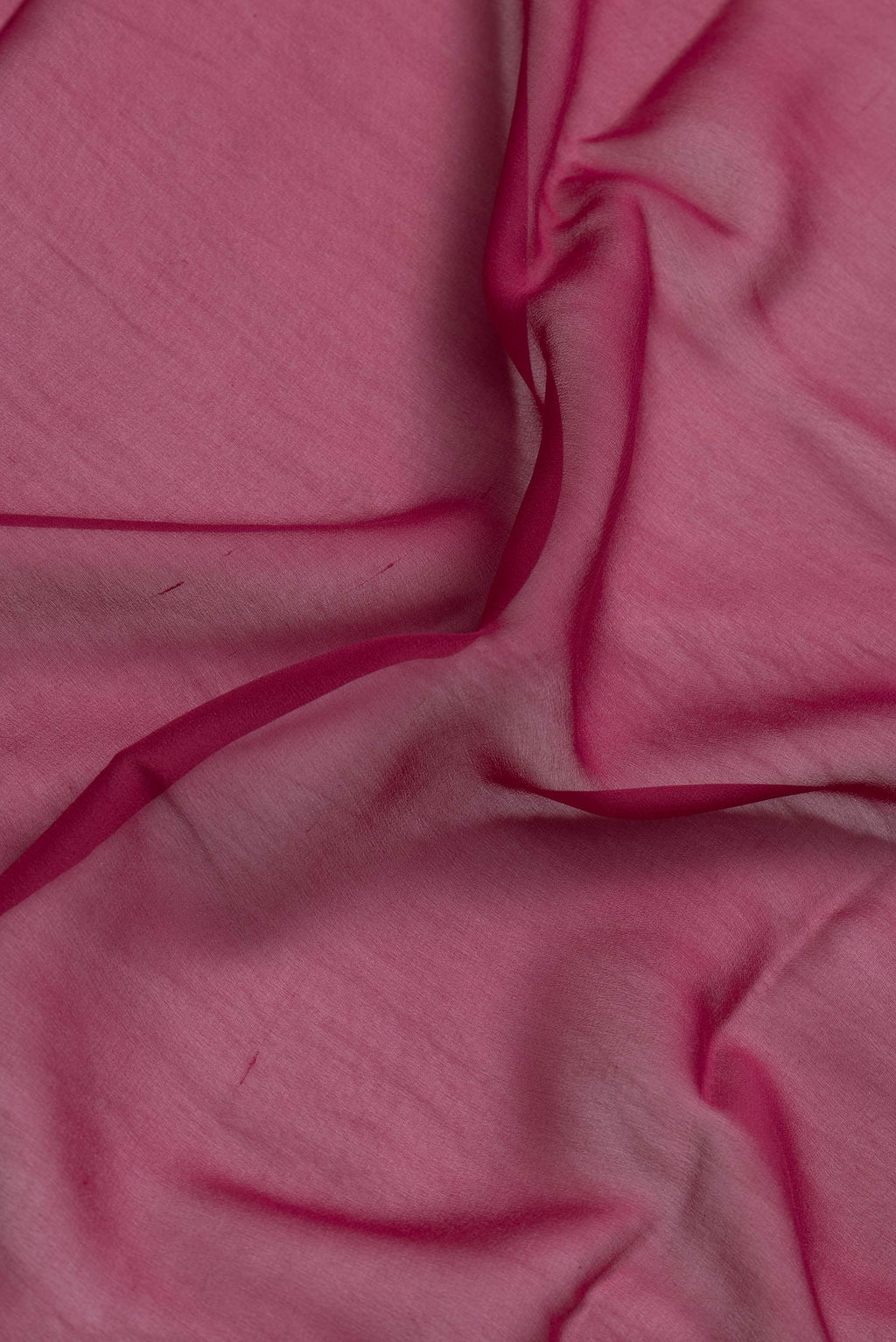 Border image of Magenta Dual Tone Georgette Saree with Plain Body and Temple Border. 