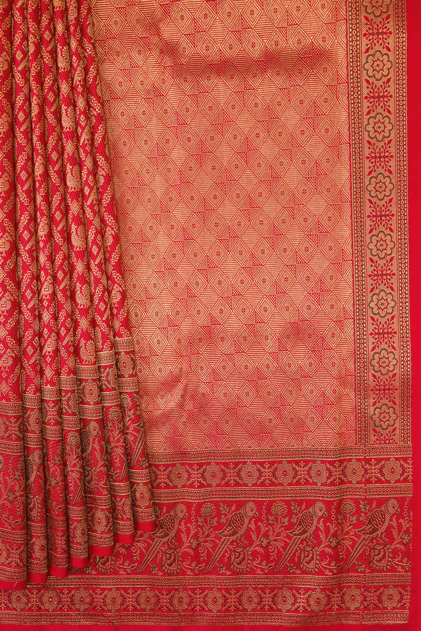 Pleats and pallu of Pure Silk Pure Zari Red Dual Tone Kanjivaram Saree with Zari Brocade on the body and Zari Border. 