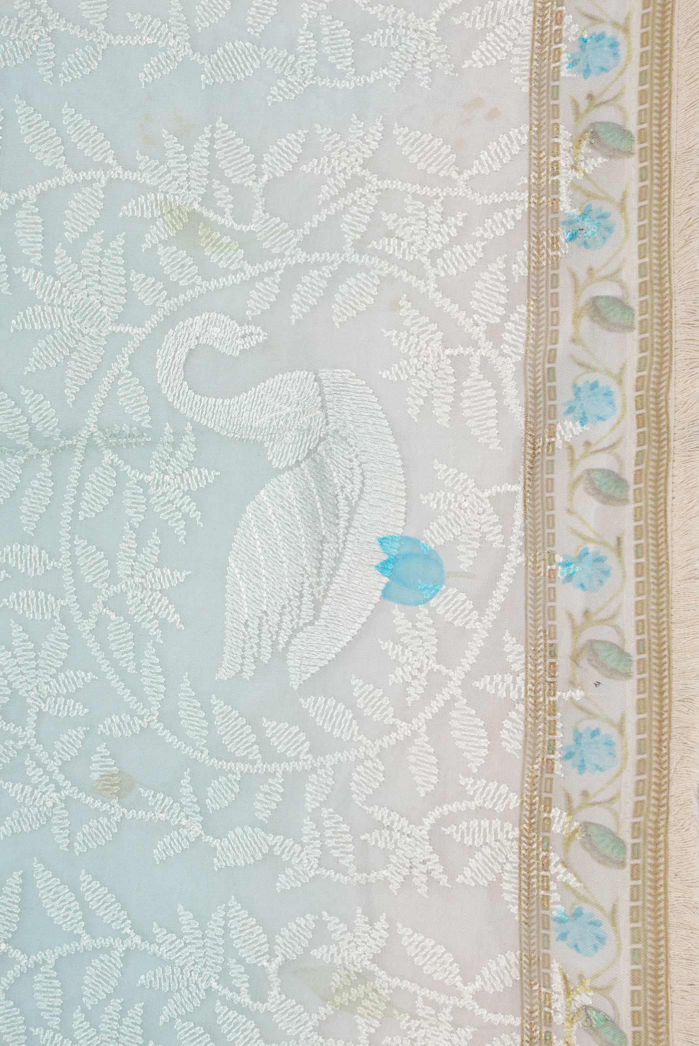 Border image of Light Blue Dual Tone Organza Silk Saree with Embroidery on the body and Embroidery Border. 