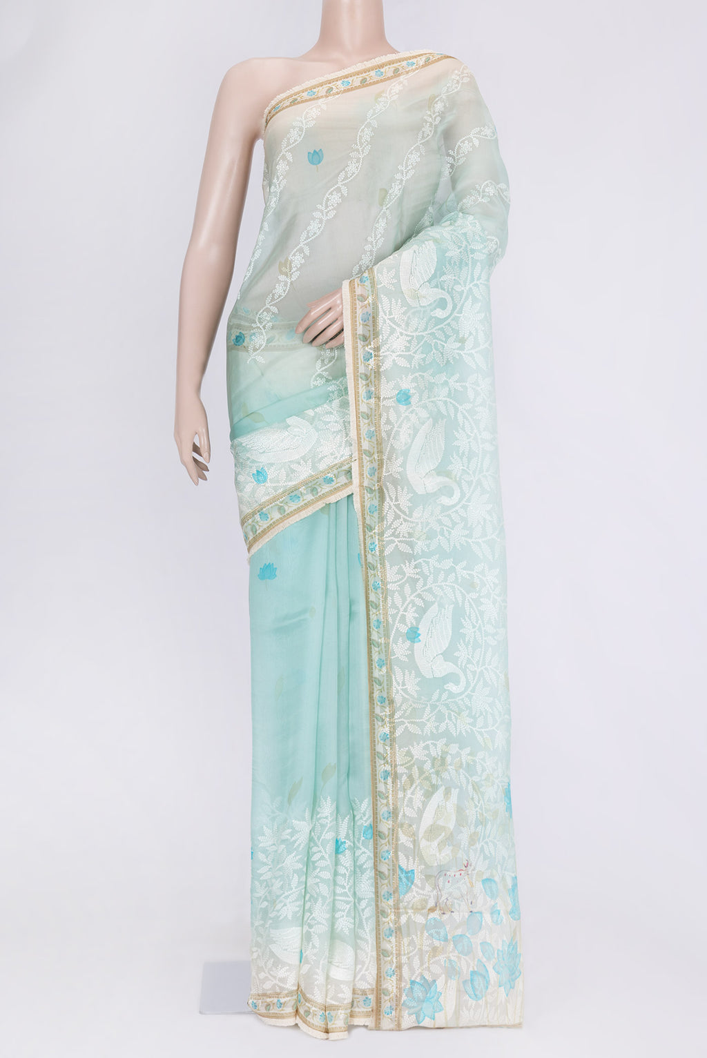 Light Blue Dual Tone Organza Silk Saree with Embroidery on the body and Embroidery Border.  displayed on a mannequin