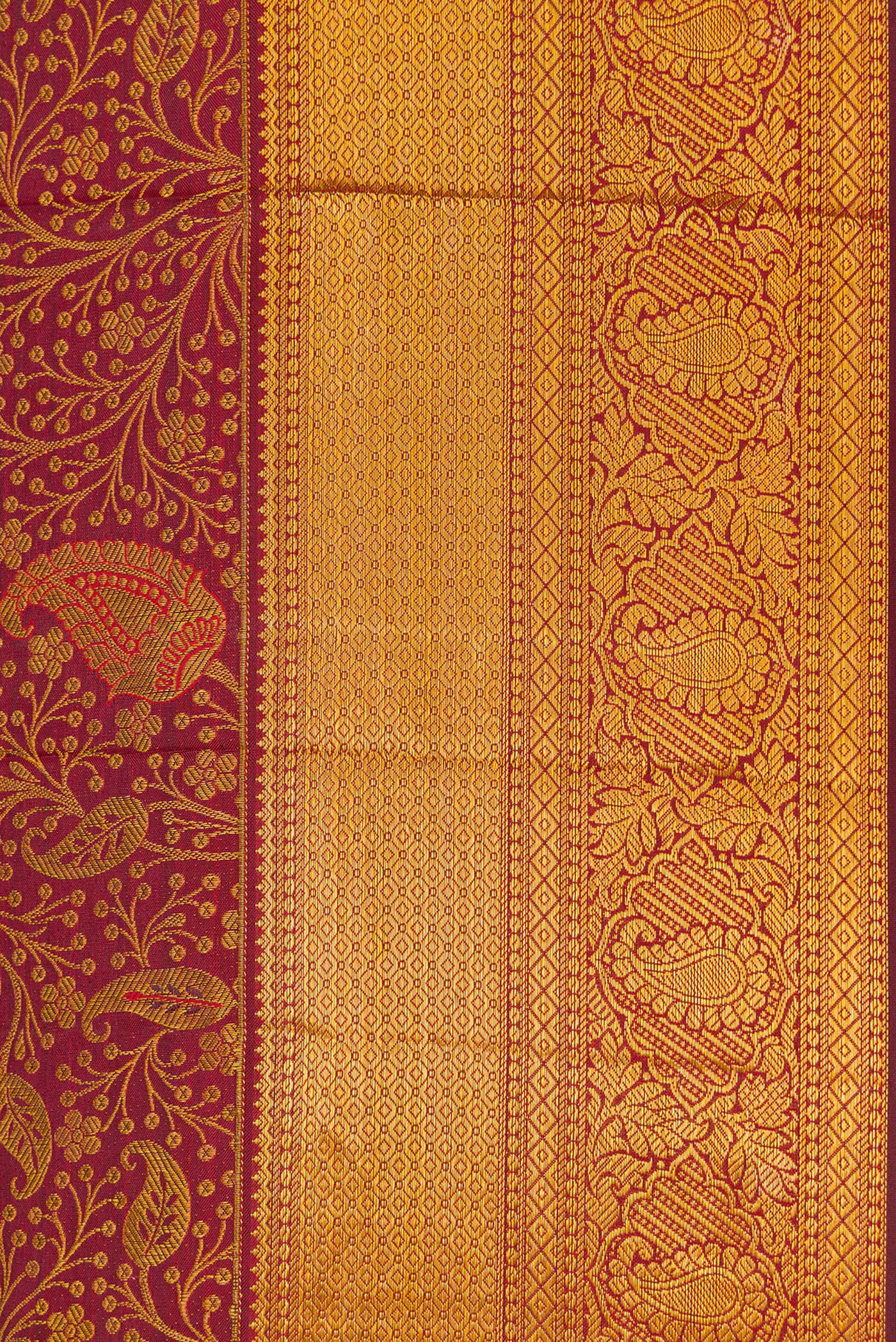 Border image of Maroon Dual Tone Kanjivaram Silk Saree with Zari Brocade on the body and Zari Border. 