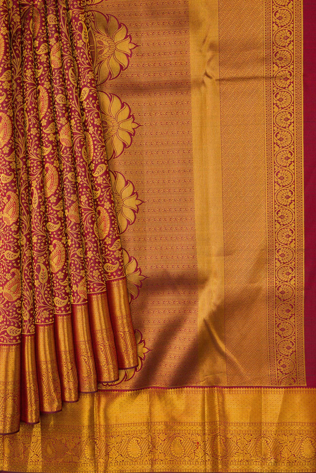 Pleats and pallu of Maroon Dual Tone Kanjivaram Silk Saree with Zari Brocade on the body and Zari Border. 