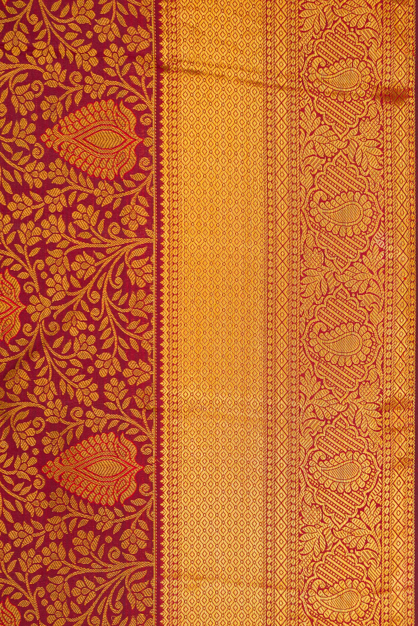 Border image of Maroon Dual Tone Kanjivaram Silk Saree with Zari Brocade on the body and Zari Border. 