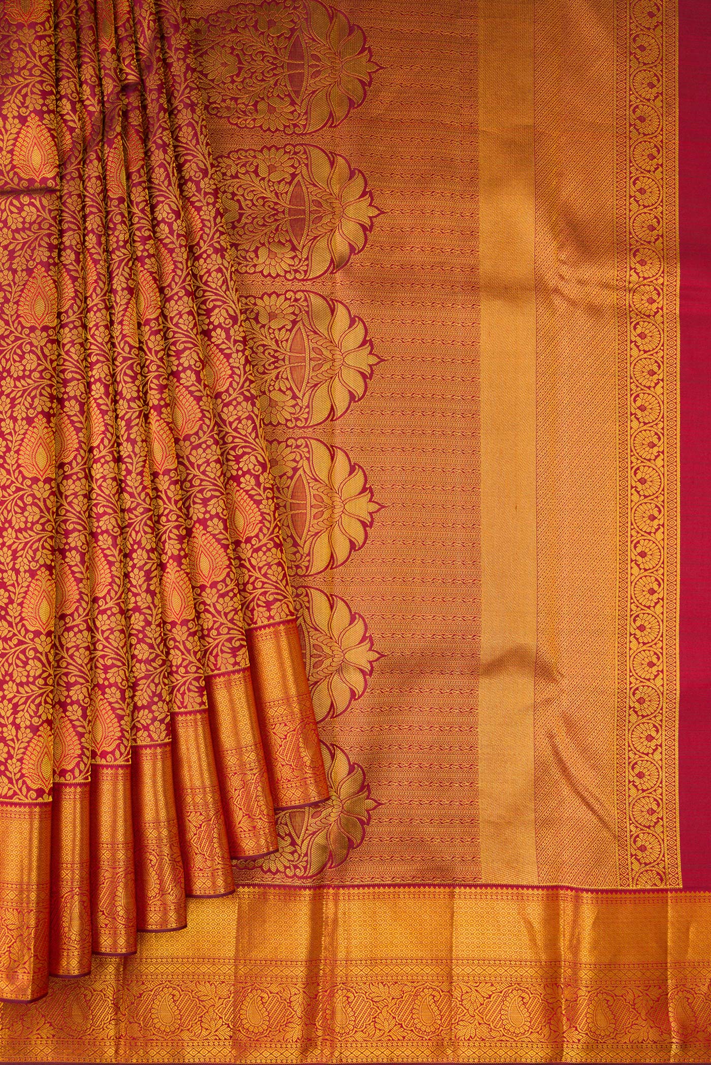 Pleats and pallu of Maroon Dual Tone Kanjivaram Silk Saree with Zari Brocade on the body and Zari Border. 