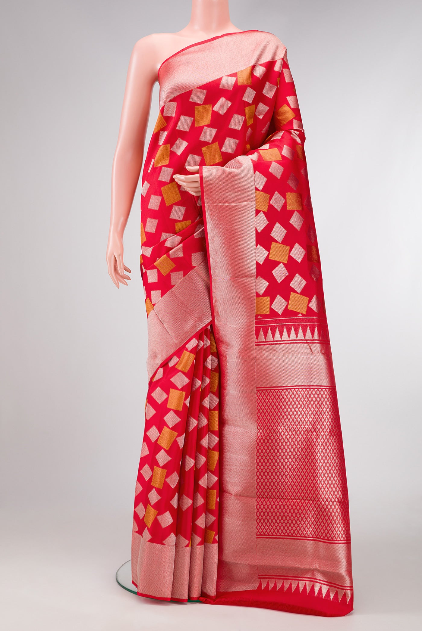 Red Dual Tone Kanchipuram Silk Saree with Zari Brocade on the body and Zari Border.  displayed on a mannequin