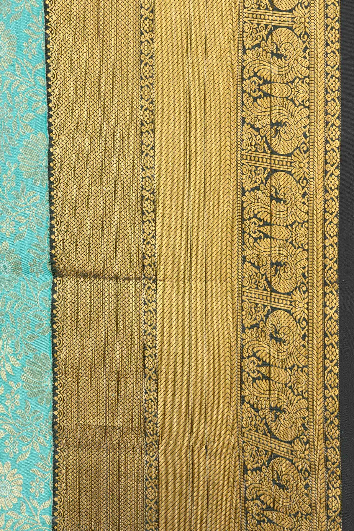Border image of Sea Green Dual Tone Kanchipuram Silk Saree with Zari Brocade on the body and Zari Border. 
