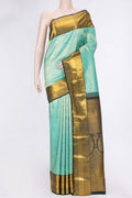 Sea Green Dual Tone Kanchipuram Silk Saree with Zari Brocade on the body and Zari Border.  displayed on a mannequin