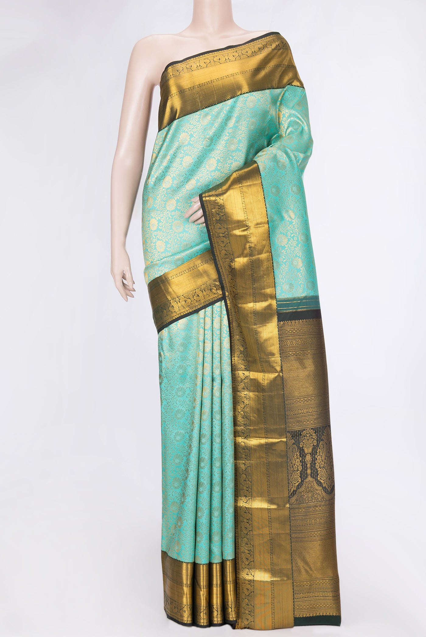 Sea Green Dual Tone Kanchipuram Silk Saree with Zari Brocade on the body and Zari Border.  displayed on a mannequin
