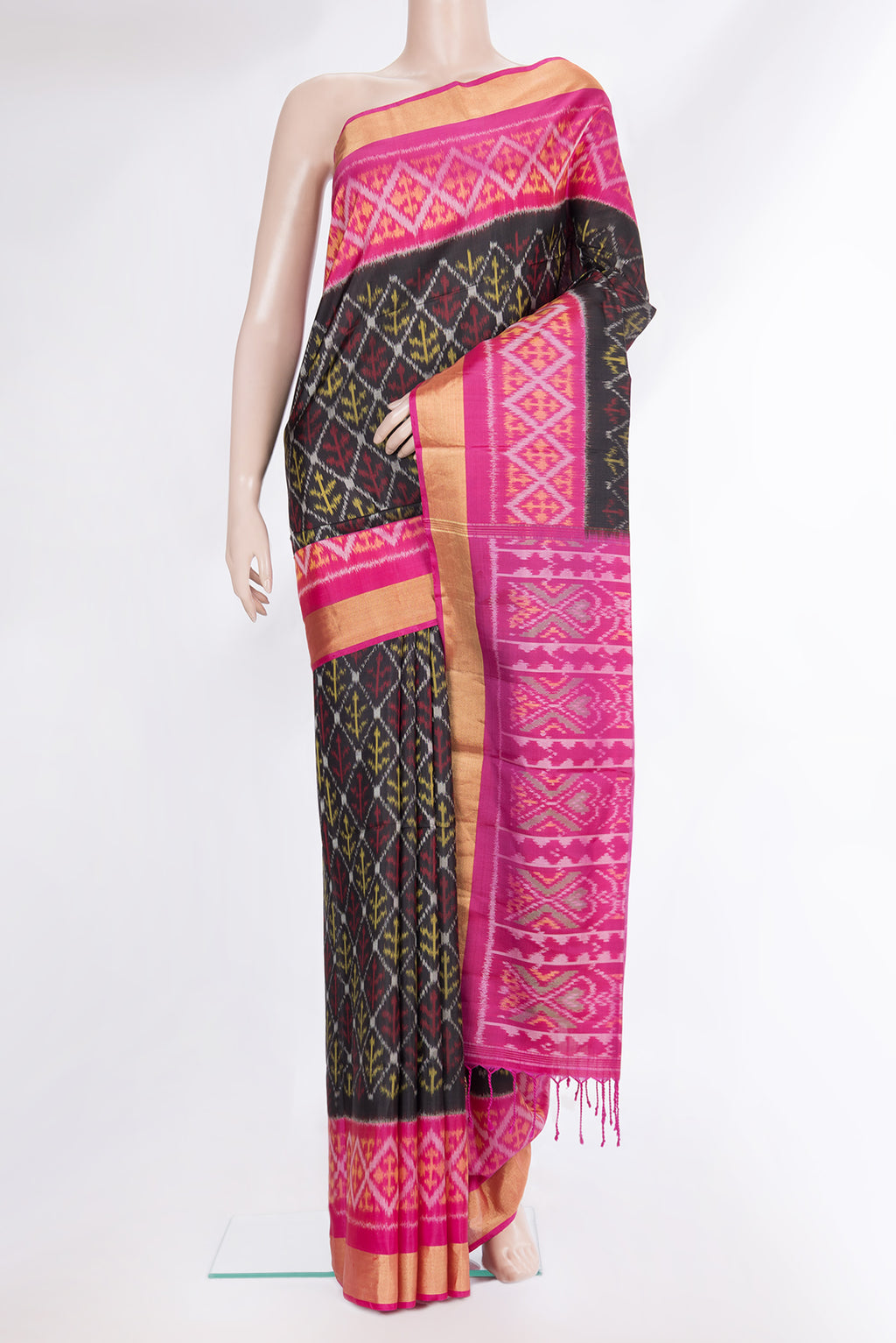 Pure Silk Black Dual Tone Soft Saree with Ikat Print on the body and Ikat Border.  displayed on a mannequin