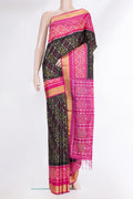 Pure Silk Black Dual Tone Soft Saree with Ikat Print on the body and Ikat Border.  displayed on a mannequin