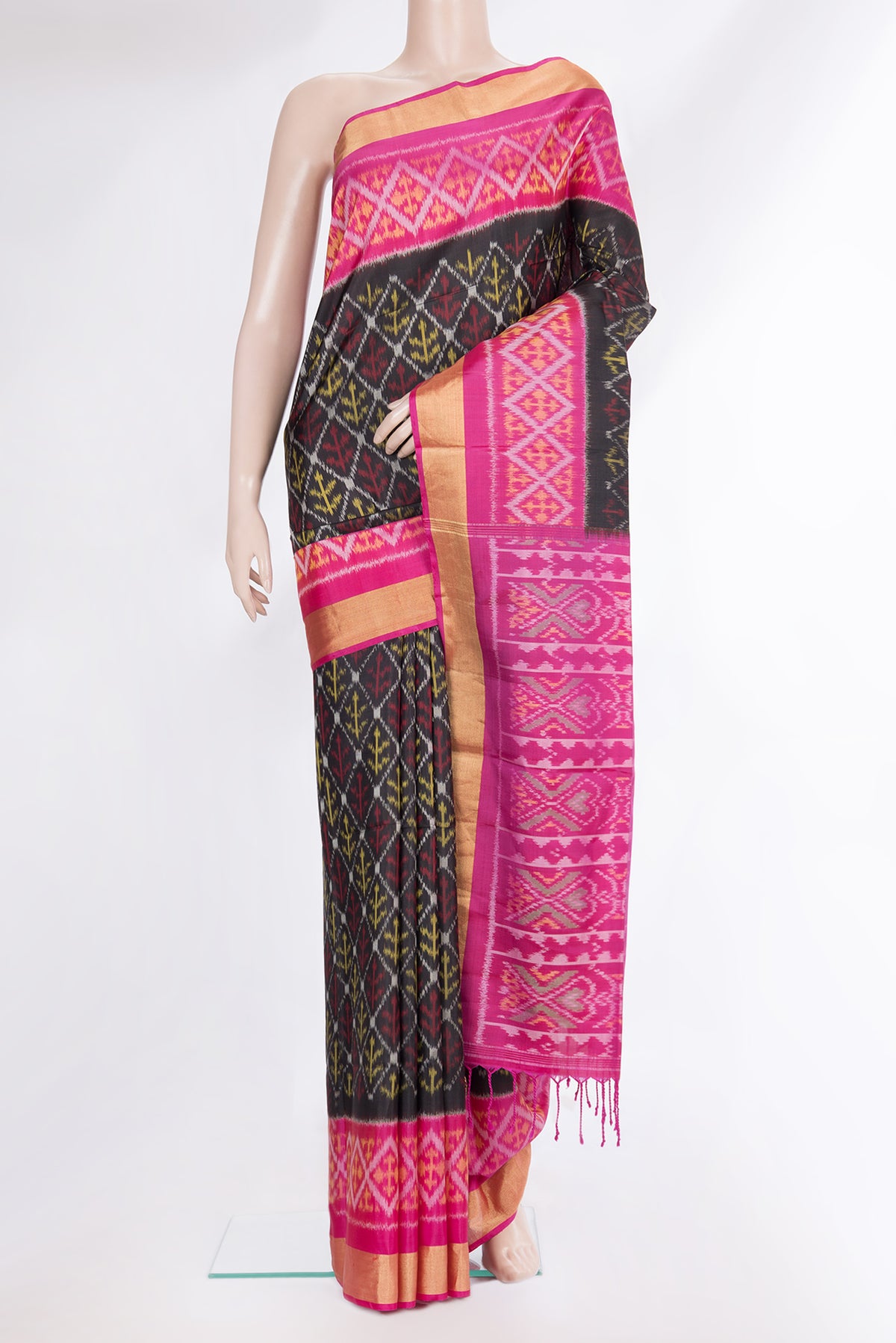 Pure Silk Black Dual Tone Soft Saree with Ikat Print on the body and Ikat Border.  displayed on a mannequin