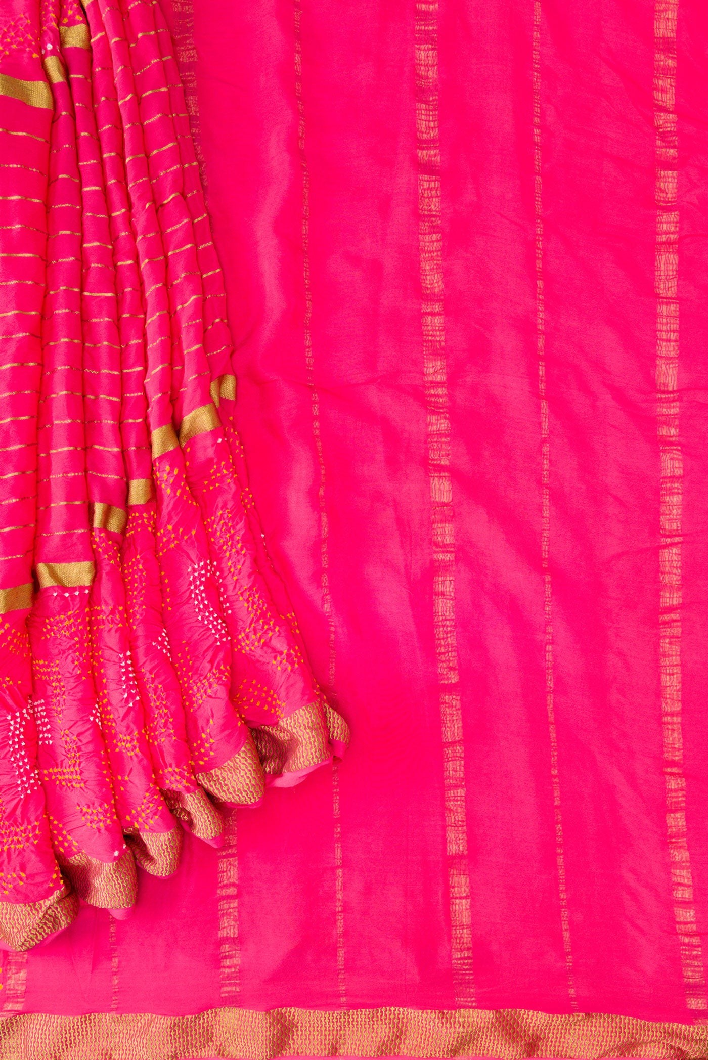 Pleats and pallu of Pink Dual Tone Bandhani Silk Saree with Bandhani Print on the body and Zari Border. 