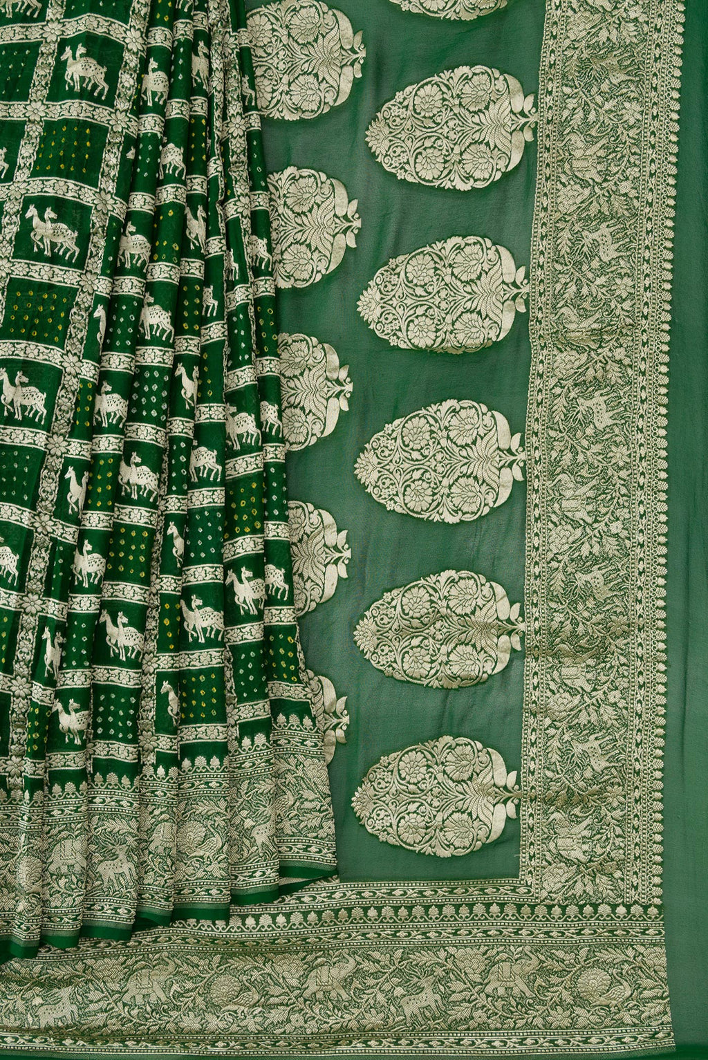 Pleats and pallu of Bottle Green Dual Tone Banarasi Georgette Saree with Zari Brocade on the body and Zari Border. 