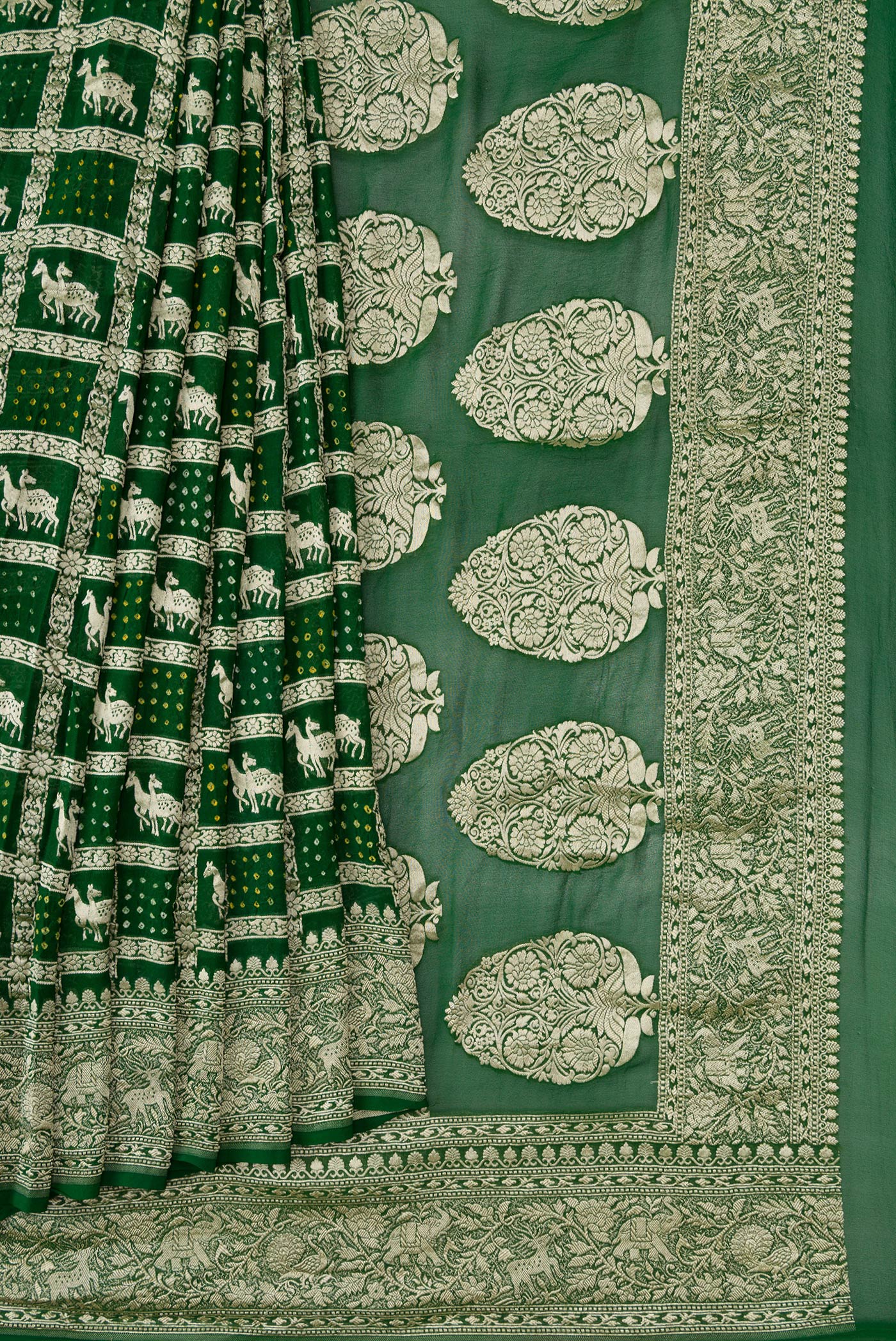 Pleats and pallu of Bottle Green Dual Tone Banarasi Georgette Saree with Zari Brocade on the body and Zari Border. 