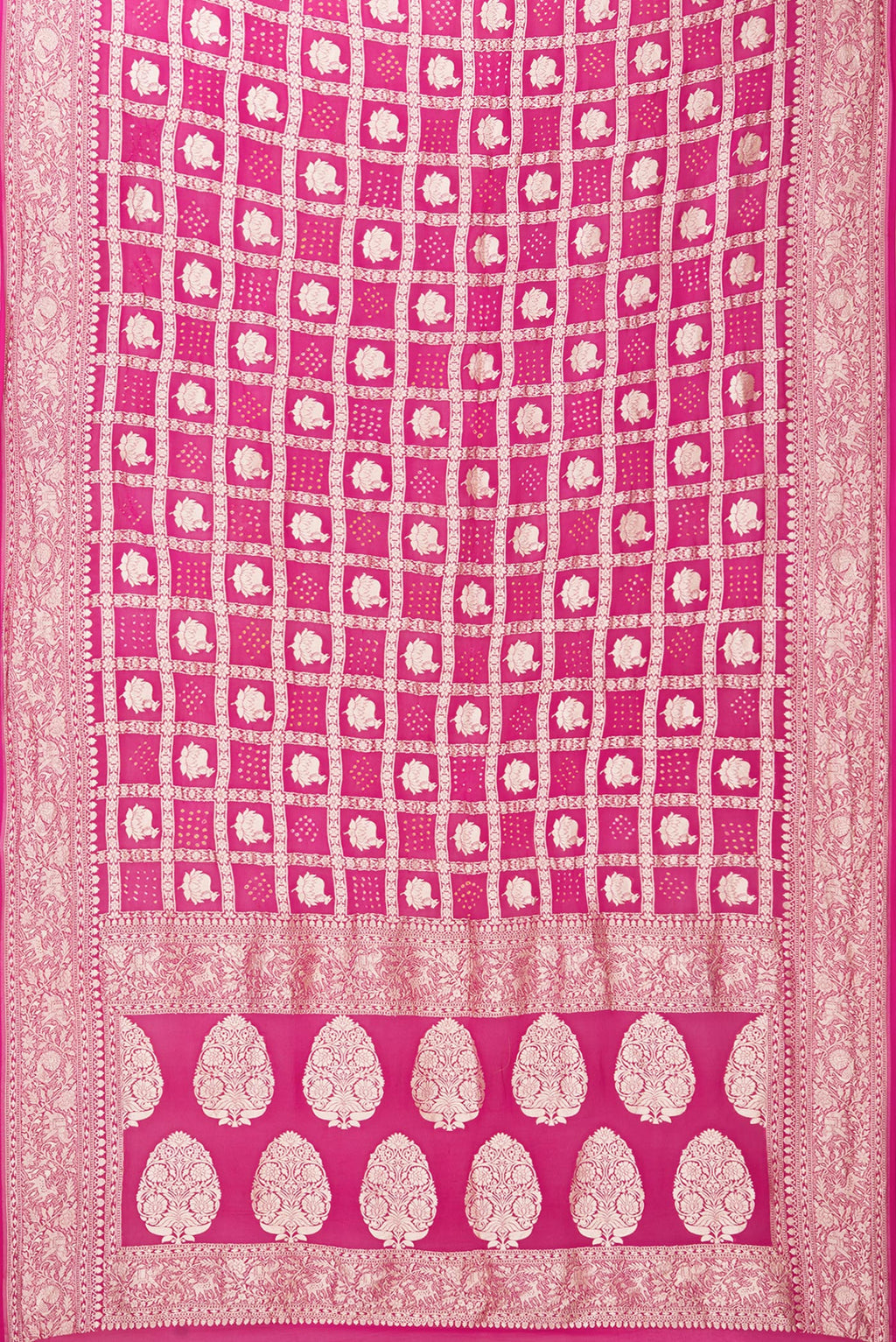 Flat view of Dark Pink Bandhani Georgette Saree with Zari Brocade on the body and Zari Border. 