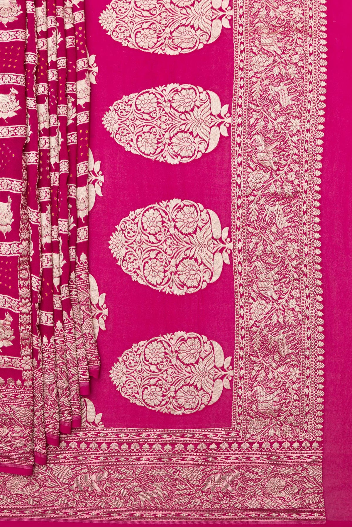 Pleats and pallu of Dark Pink Bandhani Georgette Saree with Zari Brocade on the body and Zari Border. 