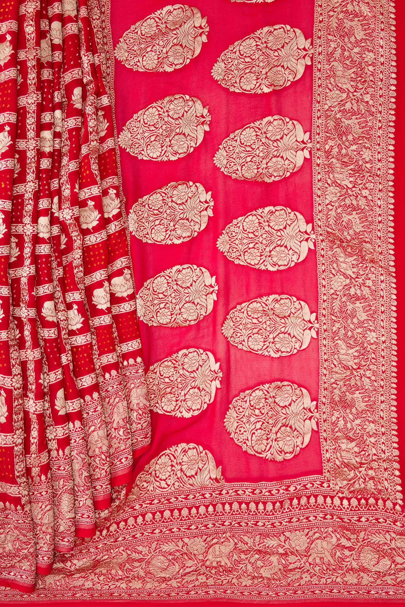 Pleats and pallu of Red Dual Tone Bandhani Silk Saree with Zari Brocade on the body and Zari Border. 