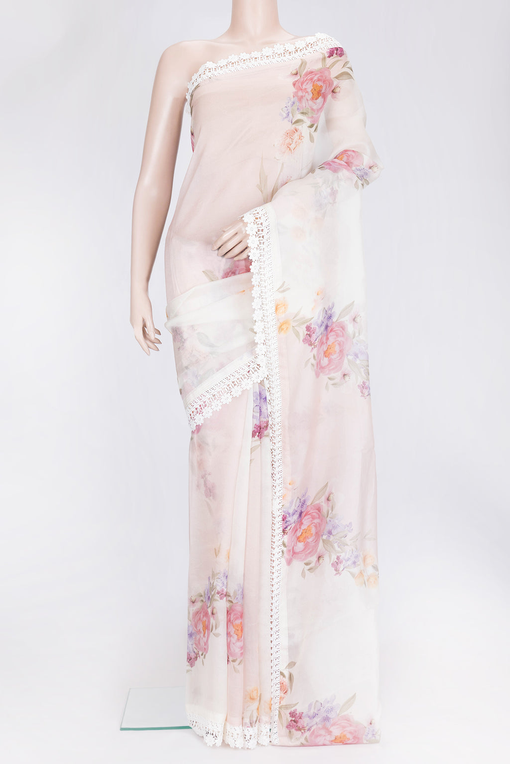Golden Peach Dual Tone Organza Silk Saree with Printed design on the body and Embroidery Border.  displayed on a mannequin