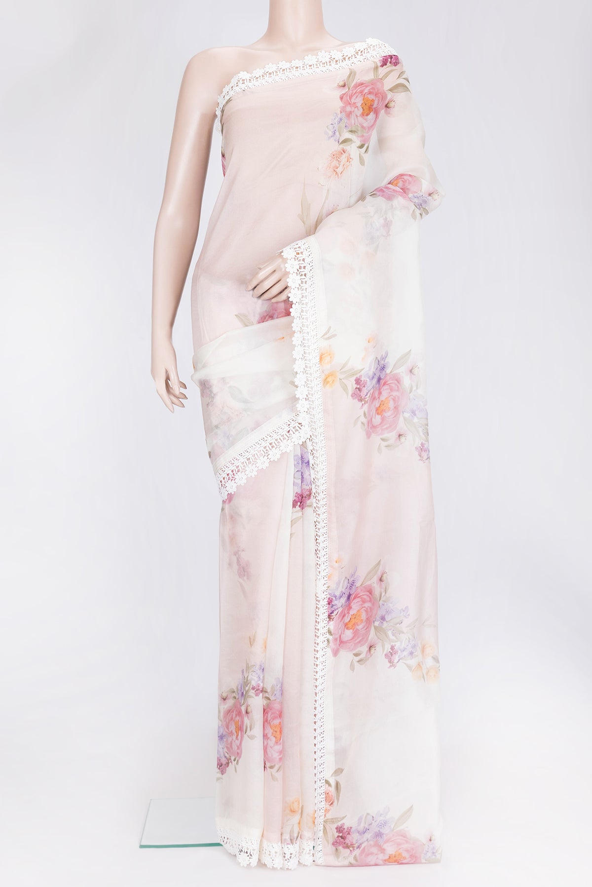Golden Peach Dual Tone Organza Silk Saree with Printed design on the body and Embroidery Border.  displayed on a mannequin