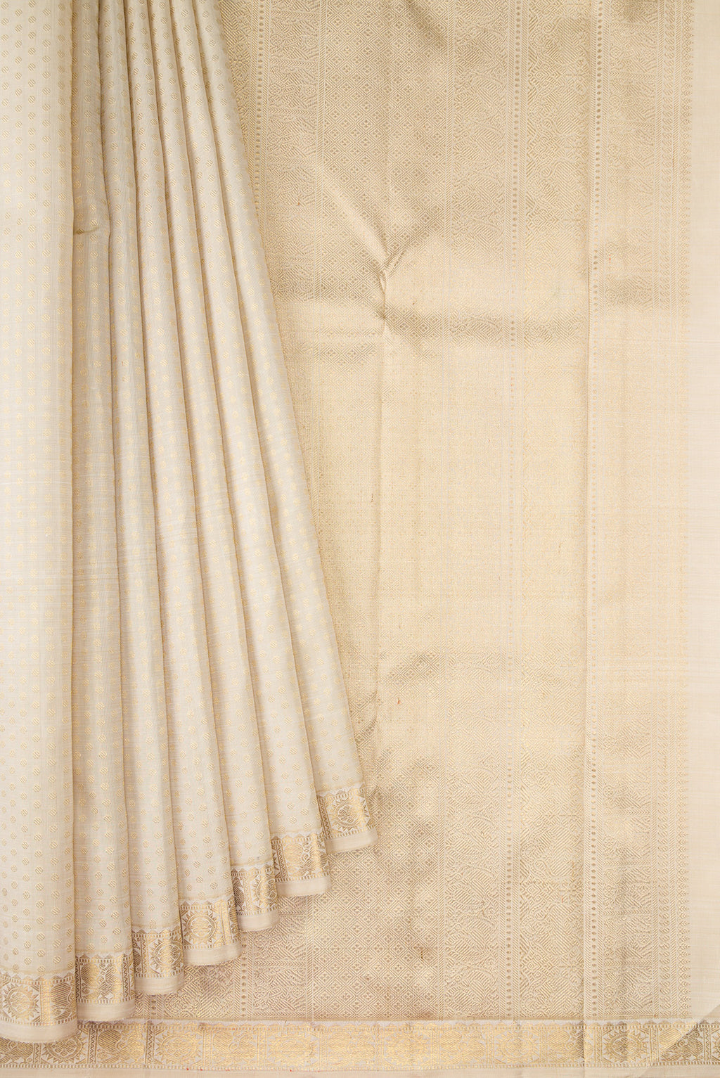 Pleats and pallu of Pure Silk Pure Zari Off White Dual Tone Kanjivaram Saree with Zari Brocade on the body and Zari Border. 