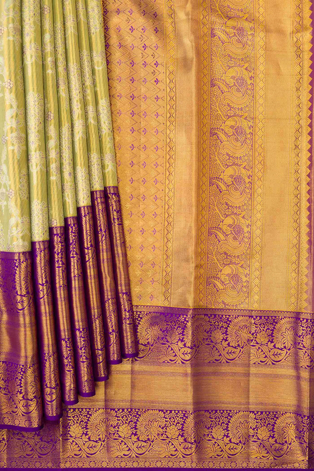 Pleats and pallu of Pista Green Dual Tone Kanchipuram Tissue Silk Saree with Zari Brocade on the body and Zari Border. 
