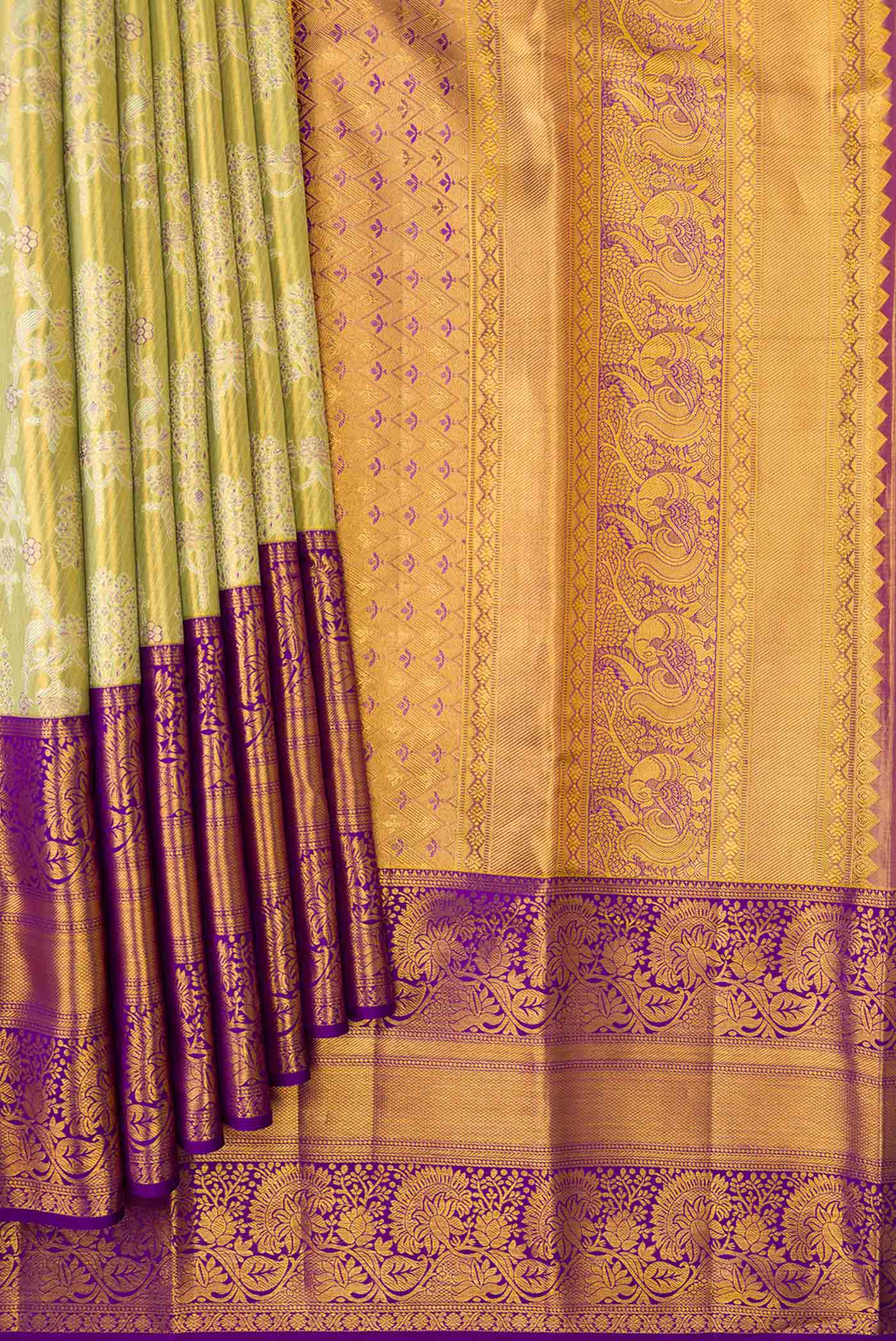 Pleats and pallu of Pista Green Dual Tone Kanchipuram Tissue Silk Saree with Zari Brocade on the body and Zari Border. 