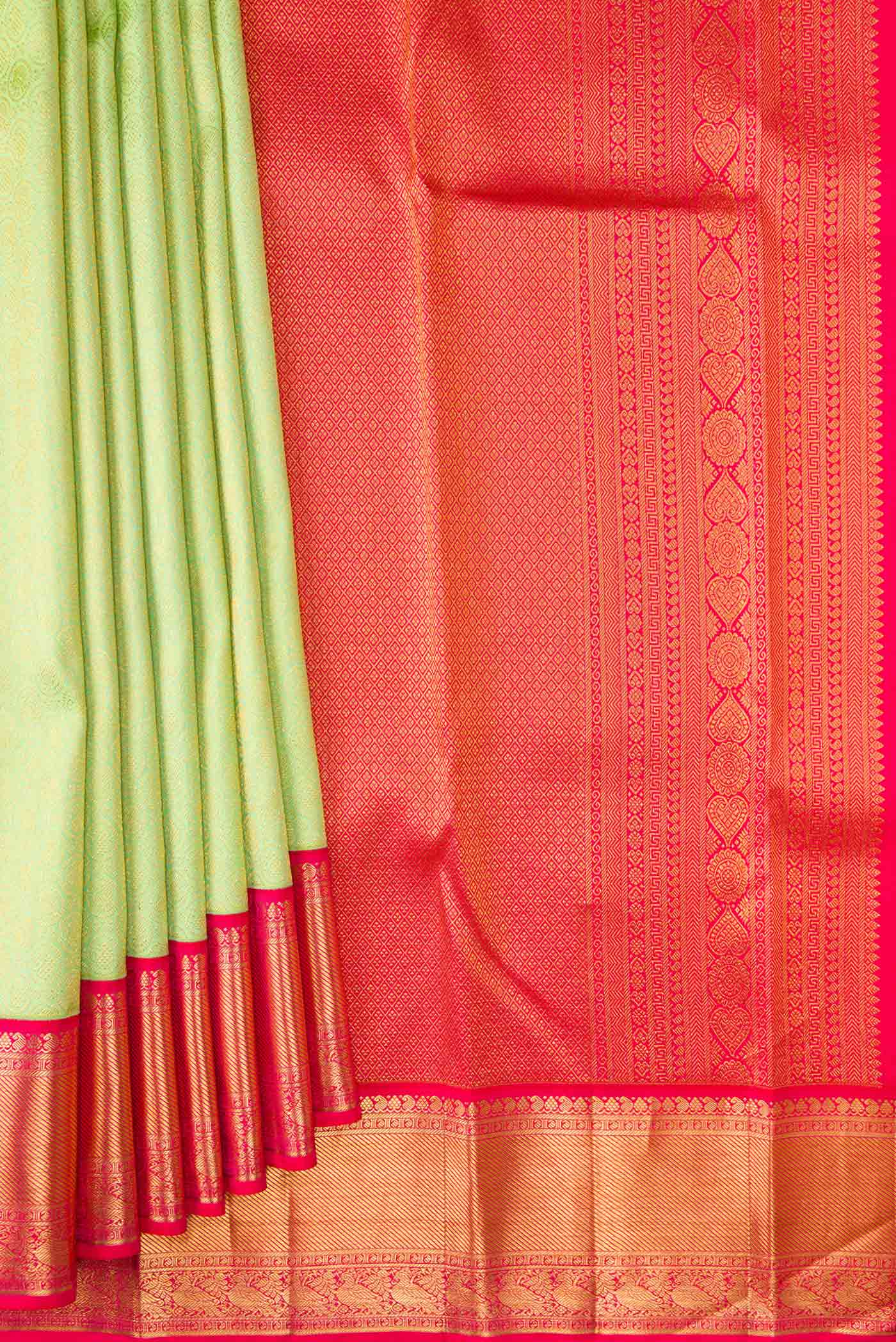 Pleats and pallu of Parrot Green Dual Tone Kanjivaram Silk Saree with Zari Brocade on the body and Zari Border. 