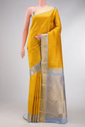 Mustard Dual Tone Kanjivaram Silk Saree with Zari Brocade on the body and Zari Border.  displayed on a mannequin