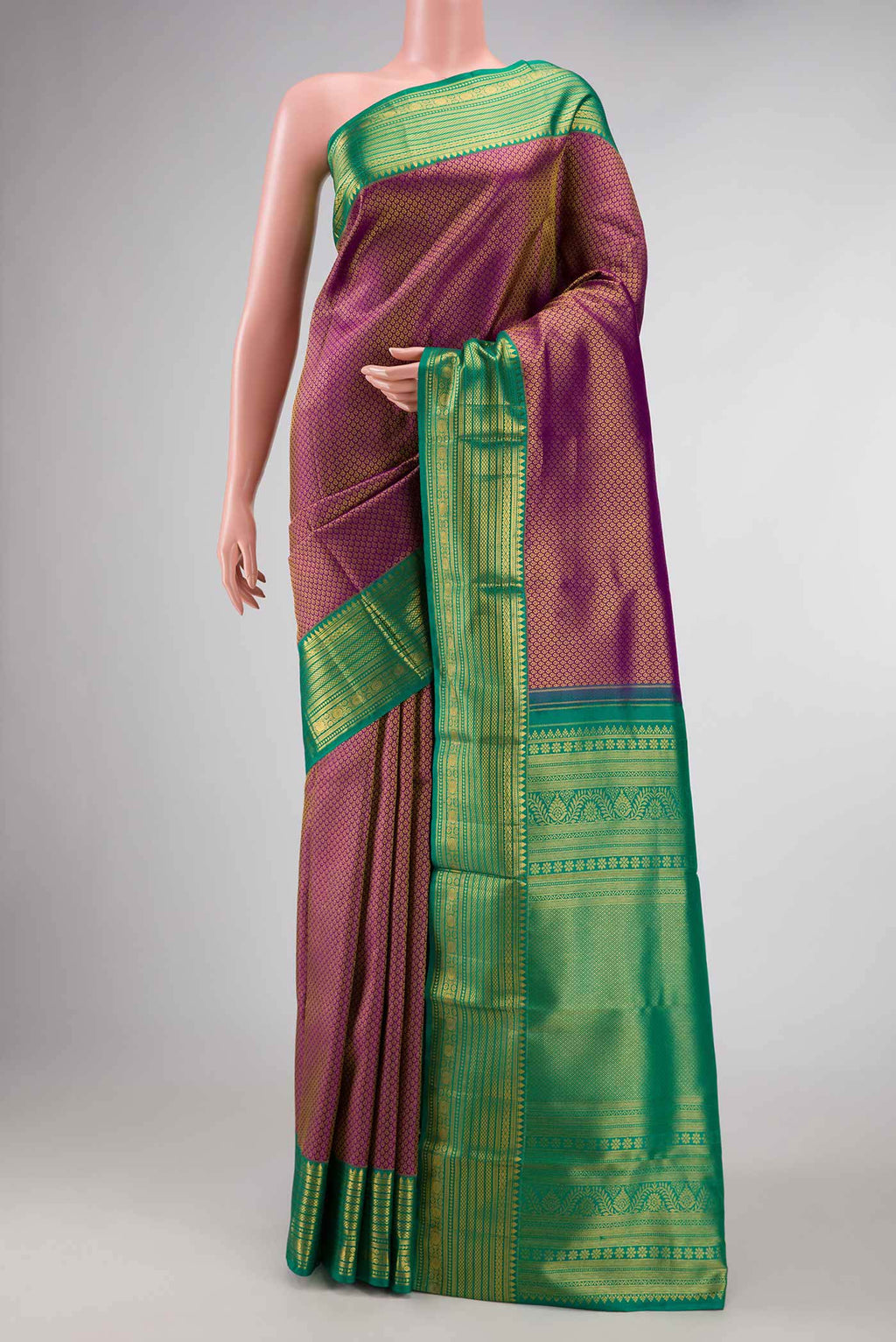 Purple Dual Tone Kanchipuram Saree with Zari Brocade on the body and Zari Border displayed on a mannequin